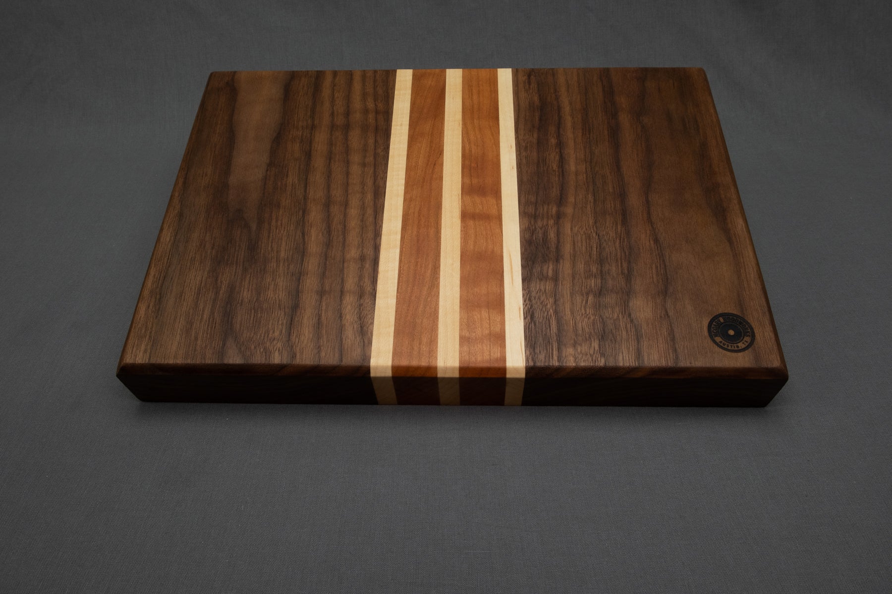 Face grain walnut cutting board with cherry and maple accent stripes - McGary Woodworks